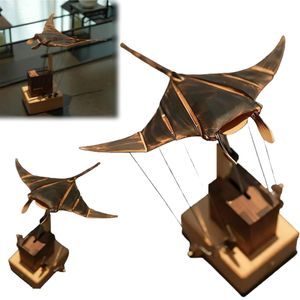 Handmade wooden manta ray sculpture by LENZIE, showcasing detailed craftsmanship and smooth, natural wood finish.