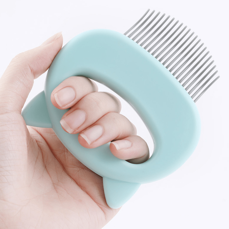 LENZIE cat grooming and massage comb with stainless steel teeth for gentle detangling and relaxing pet grooming.